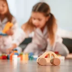What exactly does learning through play mean in a modern early childhood educational context?